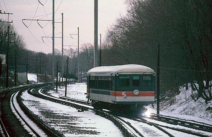 fp6.jpg - A Straford car creates sparks as it heads towards 69th St. Terminal from the Wynnewood Road station.