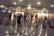 Turnstiles guard the entrance to the Jamaica station