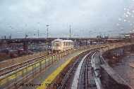 An inner-loop train leaving Terminal 4 passes us by as we approach Terminal 4