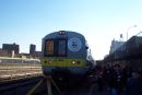 Head car and the sea of faces heading to the front to await the positioning moves.