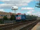 A Metra BNSF Railway line commute arrives at Naperville station. The locomotive is the unusual EMD F40PHM-2 variant, only used by Metra, and only on this route.