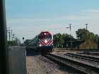 A Metra EMD F40PH leads a commuter train into Kenosha, Wisconsin, from Chicago's Ogilvie Transportation Center. A few minutes later, it will head right back to Chicago.