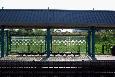 Windscreen at HBLRT's Liberty State Park station has emblems from many current and fallen flag railroads.   This station sits on land that once had approach tracks for the Central Railroad of New Jersey to its riverfront terminal, which still stands about 3/4 mile east of here. (Alan Burden photo)