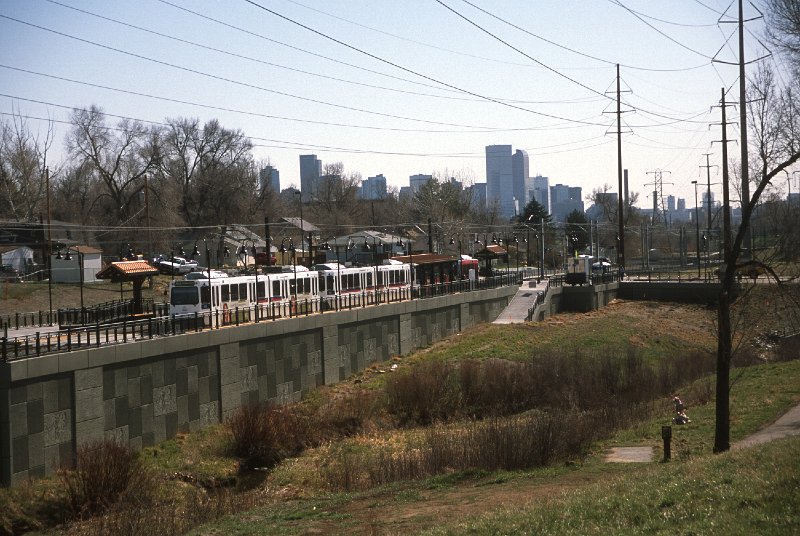 20130204-rtd.jpg - The inner portion of the W-Line follows the right-of-way of the former Denver and Intermountain Railroad line to Golden through Dry Gulch.  Here a W-Line train is inbound at Perry Station. (4/27/13)