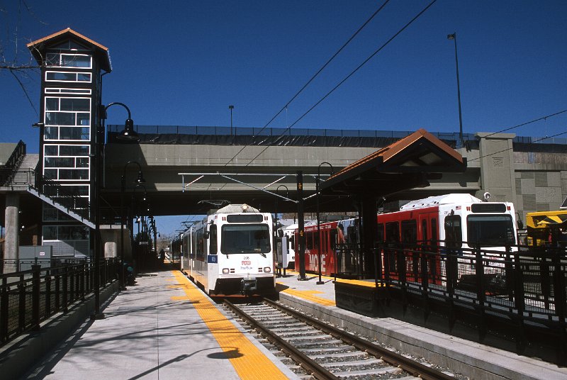 20130211-rtd.jpg - The Sheridan Station stradles the Denver/Lakewood city limits, and the boundary's path through the station is marked with "Denver" and "Lakewood" inlaid in the concrete.  This view looks west from Denver towards Lakewood.  (4/27/13)