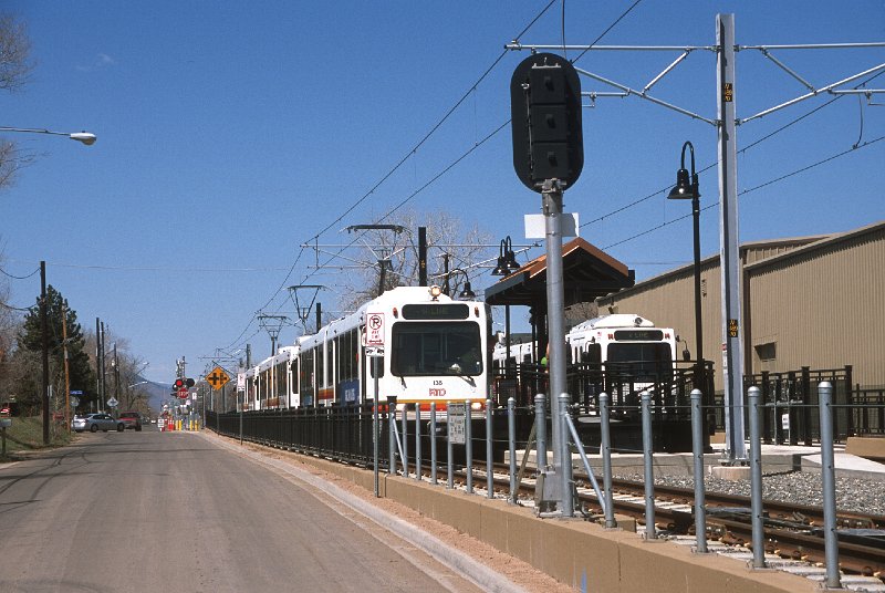 20130218-rtd.jpg - West of Sheridan Station, the line primarily parallels West 13th Avenue at grade, except for bridges over Wadsworth Blvd. (where a station is located) and Kipling Street.  This is a view at the east end of the Lamar Station. 4/27/13)